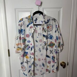 Petal & Pup White Shirt with Colorful Patterns